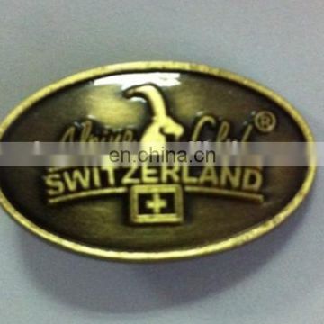 New coming gold pin badge