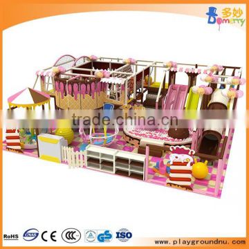 Indoor playground systems with carousel