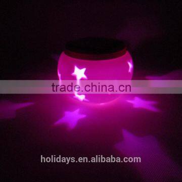 2015 New Style Ceramics Vat Shape Star Projector Solar Light
