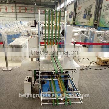 Book Paper Flattening and Stacking Machine