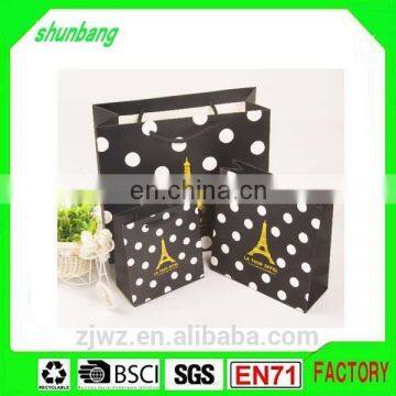 2015 fashion gold stamped paper packing bag for clothes with paper bottom