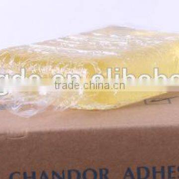 Hot melt adhesive block for sanitary towel