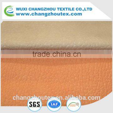 100% POLYESTER HIGH QUALITY WARP SUEDE WITH EMBOSSING AND BONDING, WITH PU ON THE SURFACE photo-2
