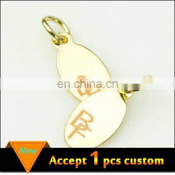 Fashion jewelry wholesale 11x6.5mm gold plating laser engraved logo custom metal jewelry tags