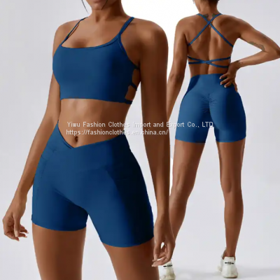 Wholesale fitness yoga wear 2 piece active wear set women gym multi strap open back sports bra front cross over mini shorts set