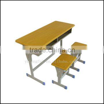 Adjustable double school desk and stool set, moulded pressing table