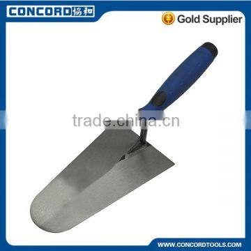 Bricklaying trowel with soft grip, carbon steel blade with S tange