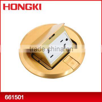 Round pop-up floor socket with UK receptacle and data-com