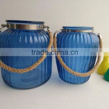 glass hurricane lamps, colored glass canisters