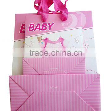 China Cute baby paper gift bag with cotton ribbon handle