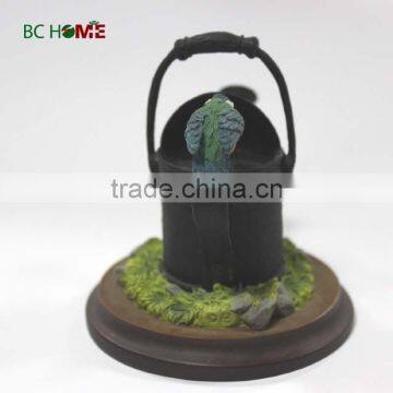 Resin watering can with a bird on it sprinkling can garden decoration