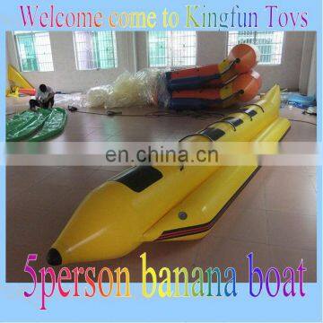 Single tube inflatable banana boat on water