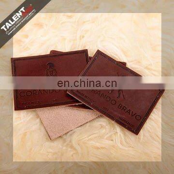 High Quality Customized Private Brand Name Logo Jeans Genuine Leather Patch in Garment photo-4