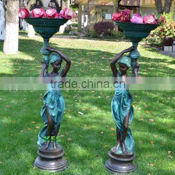 Decorative bronze outdoor statue of angel with flowerpot