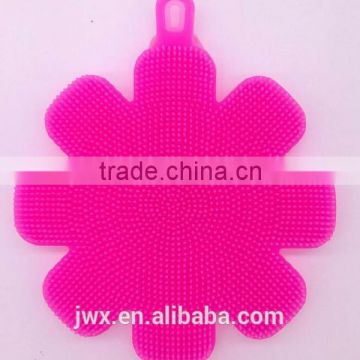 Pink silicone face washing brush for household usage