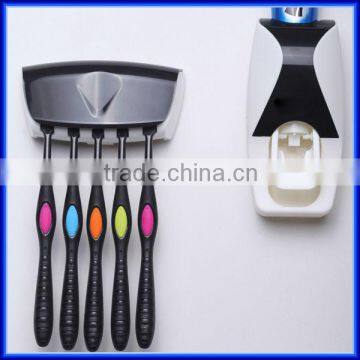 Hot sell automatic plastic toothpaste dispenser & toothbrush holder for christmas gift gadget, funny covered carbon brush holder