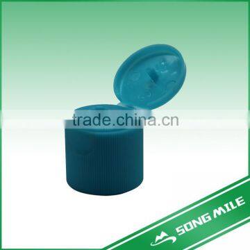 Flip top cap for body wash bottle