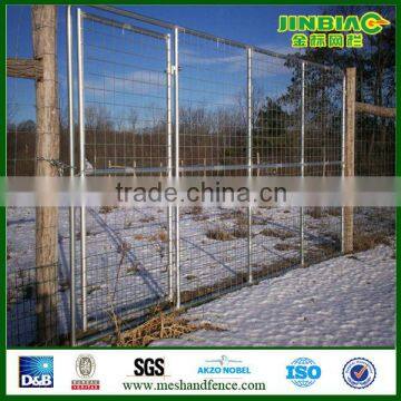 Tall galvanized metal fence gate with 4-walk