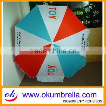 strong wooden straw beach umbrella