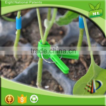 Planting used plastic pacifier spring loaded clips grafting tube