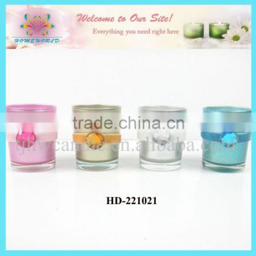 glass candle holder with artificial sequins decoration