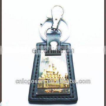 collection dubai souvenirs items metal and leather key chain