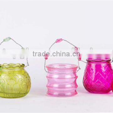 decorative lanterns with colored glass for candles