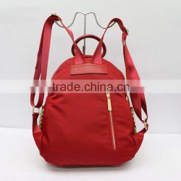 The new red embossed leather casual backpack, Wemen handbags