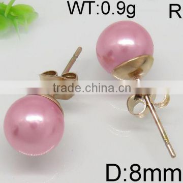 Alluring gold earring with pink ball