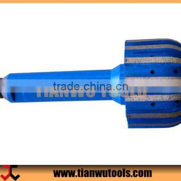 Diamond grinding roller bit