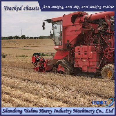 Wheat Harvester Modified With Triangular Track Wheels for Muddy Terrain Operation to Prevent Slipping photo-4