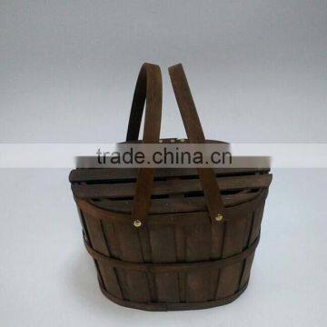 Wood chip picnic basket with stiff swing handles