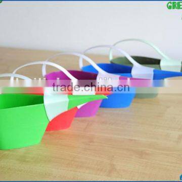 plastic watering can and flower can for garden