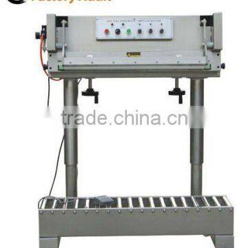 penumatic sealing machine with conveyor