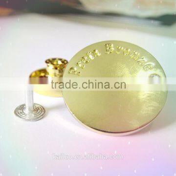 a crystal gold color jeans button