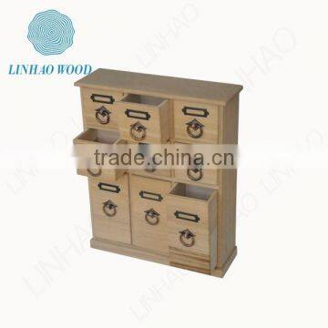 Wooden tea box with drawers