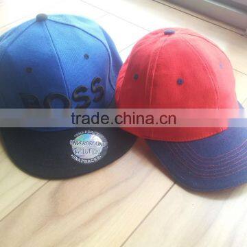 red baseball cap with white embroidery logo