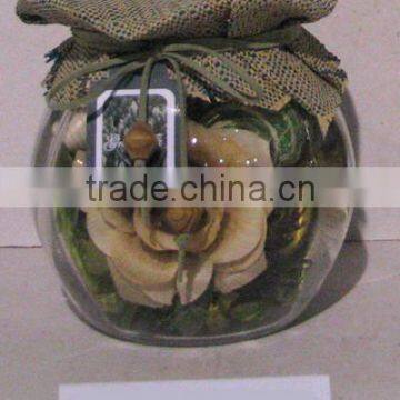 Potpourri And Dried Flower In Glass Vase With Cotton Cover
