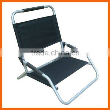 Folding sand chair with shoulder strape