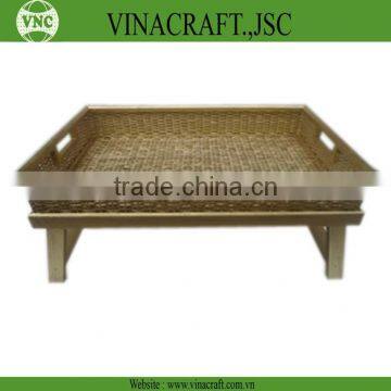 Gold painted rattan tray with legs