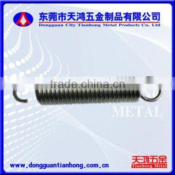Precise anti-shock tensile spring