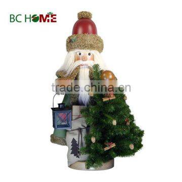 exquisitely crafted santa claus wooden Nutcracker with present