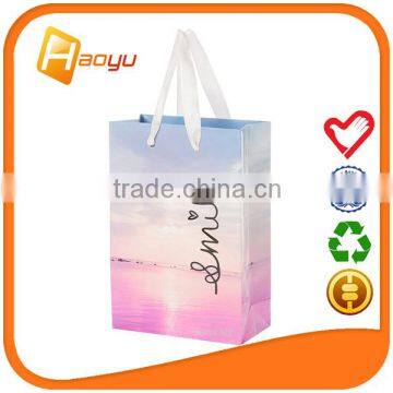 Manufacture slogan paper bag with handle for gift bag