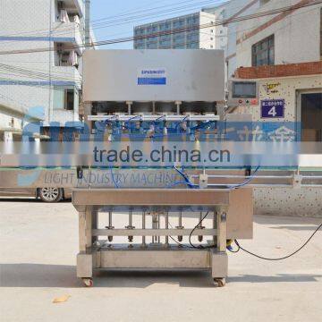 SPX-Automatic 4 nozzles liquid filling machine for bottle with servo controller