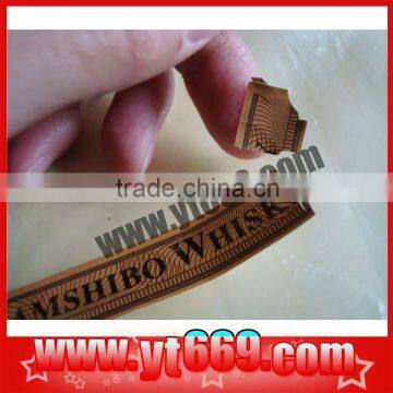 Brittle security seal sticker