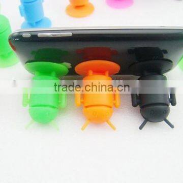 Cheap robbot shaped silicone cellphone accessory display stand with sucker