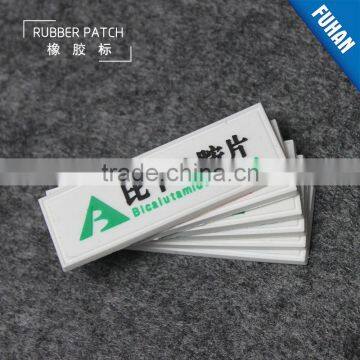 Embossed Custom White Background PVC Rubber Patch Logo photo-3