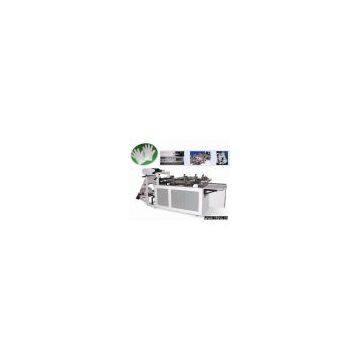 Glove making machine
