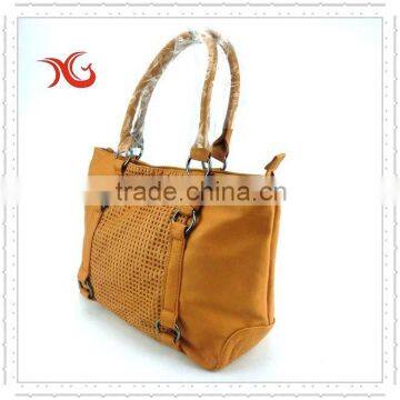 2015 Fashion brown perforated ladies handbag