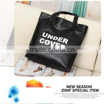 2015 new European and American fashion PU leisure shopping bag black/white shoulder bag UNDER COVER letter bags